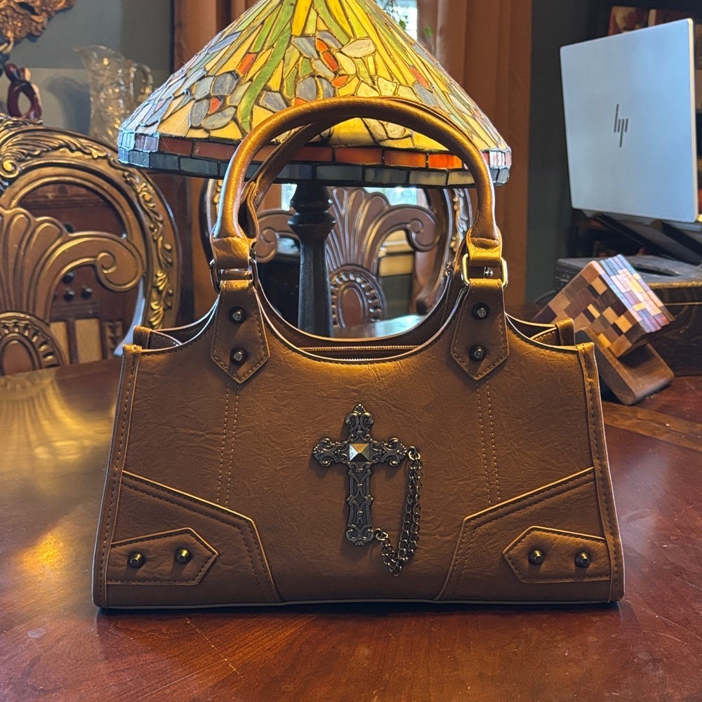 NWOT crossbody handbag with cross and chain hardware
